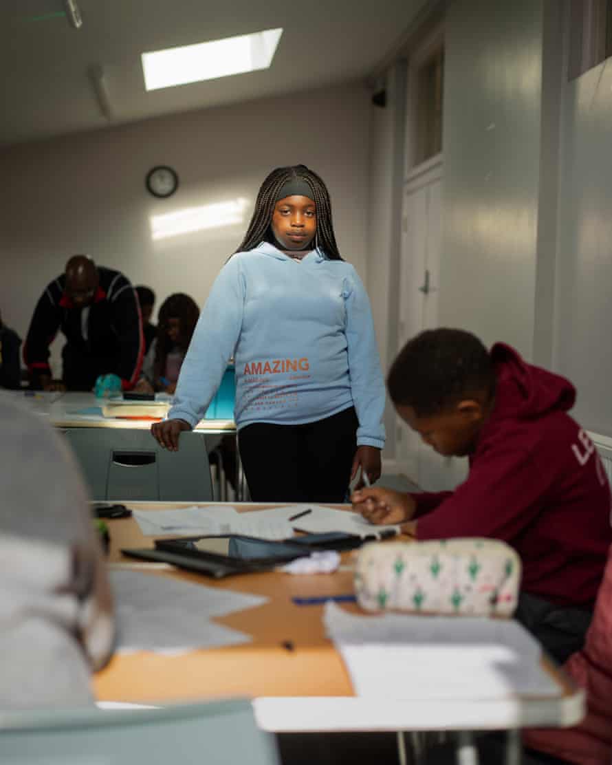 Akacia Complementary School, High Wycombe: Hannah, 12. ‘I come here for 3.5 hours on Saturday mornings during term times. I love the maths classes. Mr Katumwa, the teacher, thinks that if I continue to work hard, I may be able to take my GCSE early.’